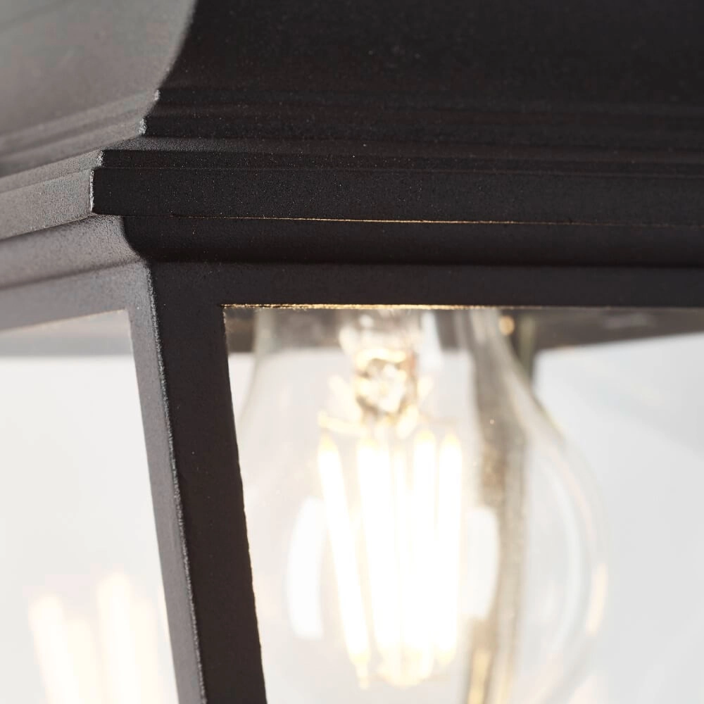 Schwarze Wandlampe Nissie runter Brilliant 4004353356520