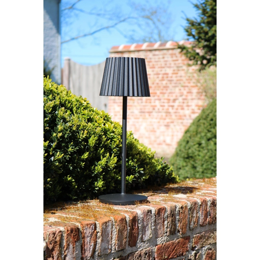 Wiederaufladbare Tischlampe Justine Schwarz mit Ladestation Lucide 5411212272171