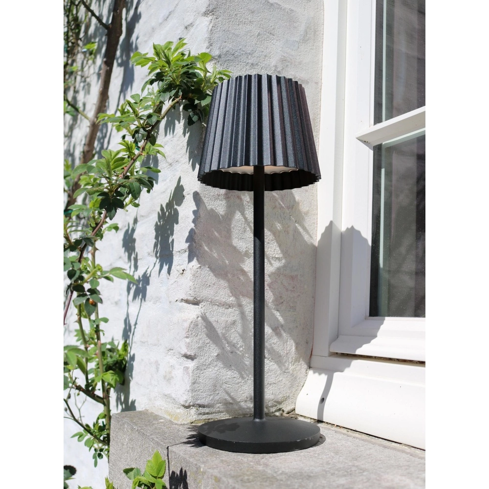 Wiederaufladbare Tischlampe Justine Schwarz mit Ladestation Lucide 5411212272171