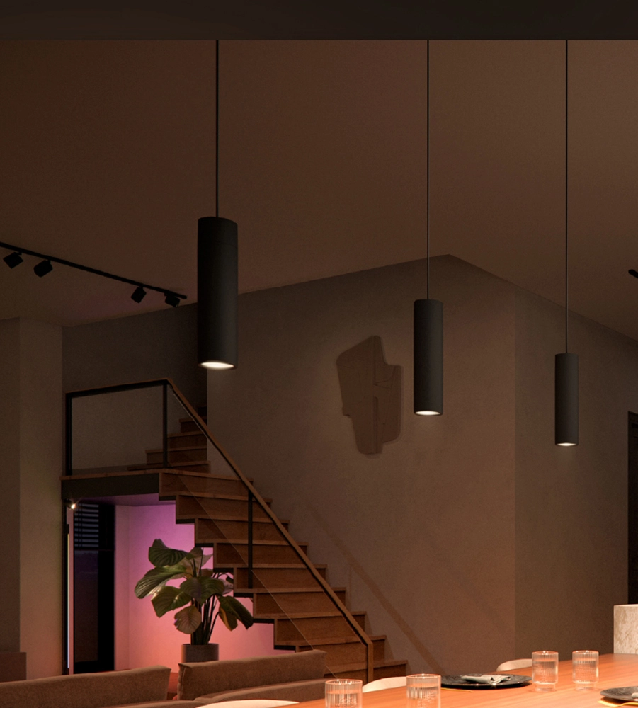 Philips Hue Pendelleuchte über Esstisch in modernem Zuhause