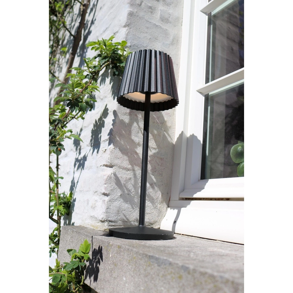 Wiederaufladbare Tischlampe Justine Schwarz mit Ladestation Lucide 5411212272171