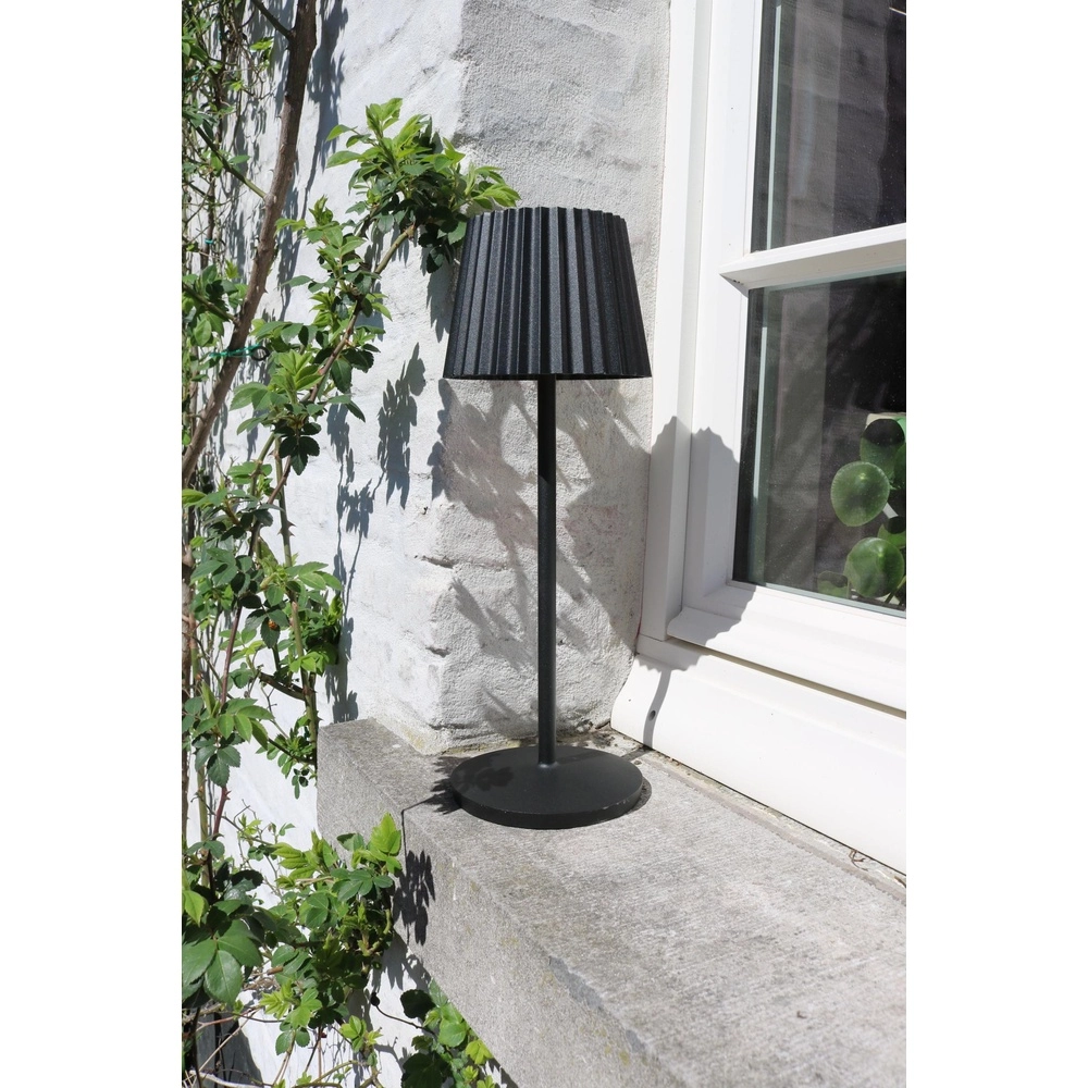 Wiederaufladbare Tischlampe Justine Schwarz mit Ladestation Lucide 5411212272171